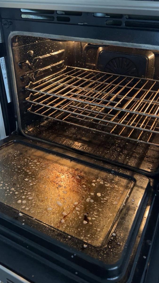 Wall oven with baked-on grease, before the deep clean